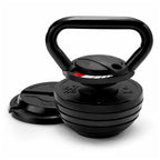 Black cast iron kettlebell with weight markings on a white background