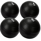 4 black heavy duty slam balls with a textured surface and the white background