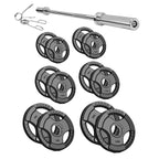 Set of weight plates, barbell, and attachments on a white background