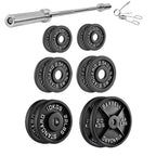 Set of weight plates and barbell on a white background